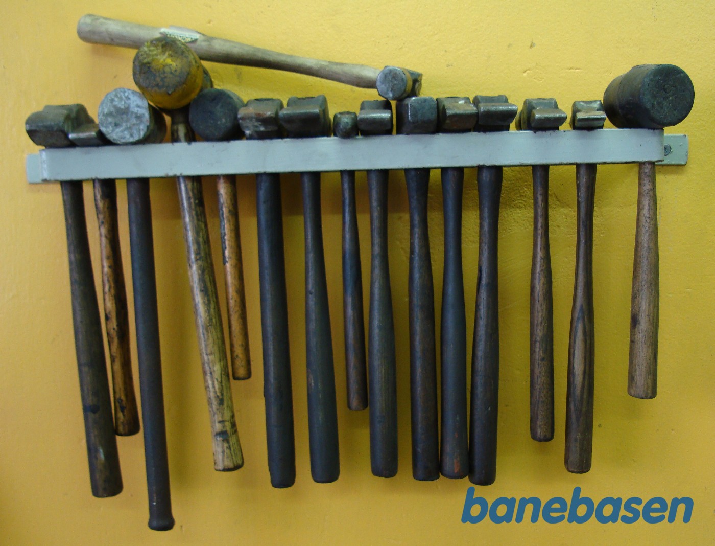 Vægholder med hamre Vægholder med hamre