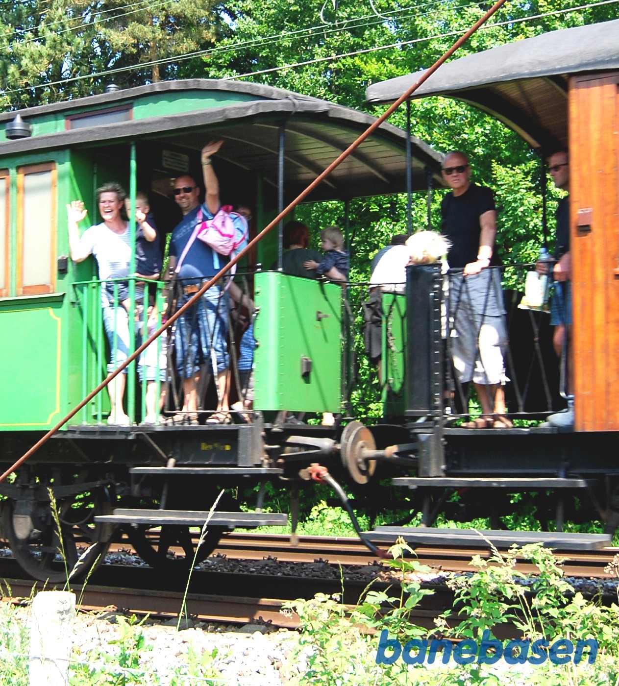 Foto af vinkende passagerer Foto af vinkende passagerer