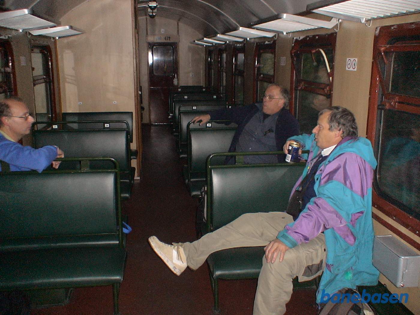 Tre turister i toget en stille eftermiddag