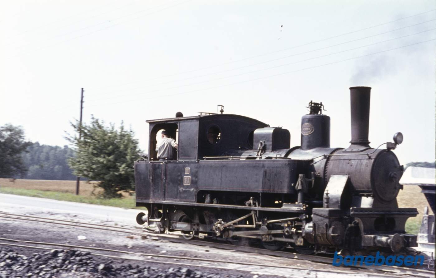 Damplokomotiv med tipvogne