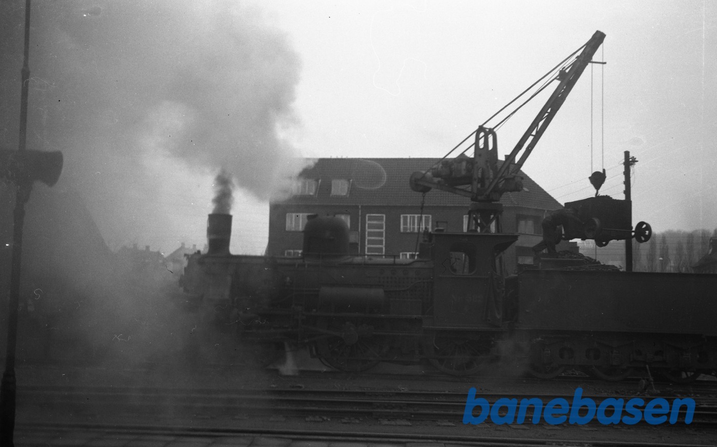 Damplokomotiv K 582 ved kulkranen i Kalundborg Damplokomotiv K 582 ved kulkranen i Kalundborg