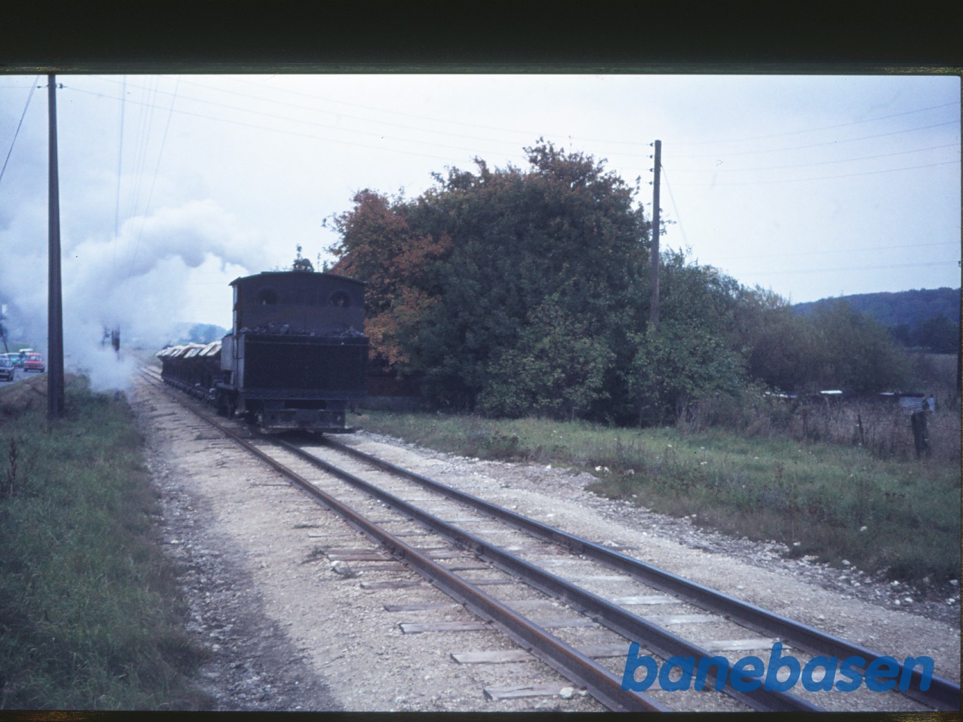 Damplokomotiv nr. IV med tog på vej mod Fakse Ladeplads Damplokomotiv nr. IV med tog på vej mod Fakse Ladeplads