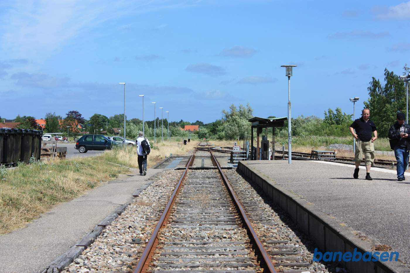 Der ude i horisonten ender banen i en rød skive Der ude i horisonten ender banen i en rød skive