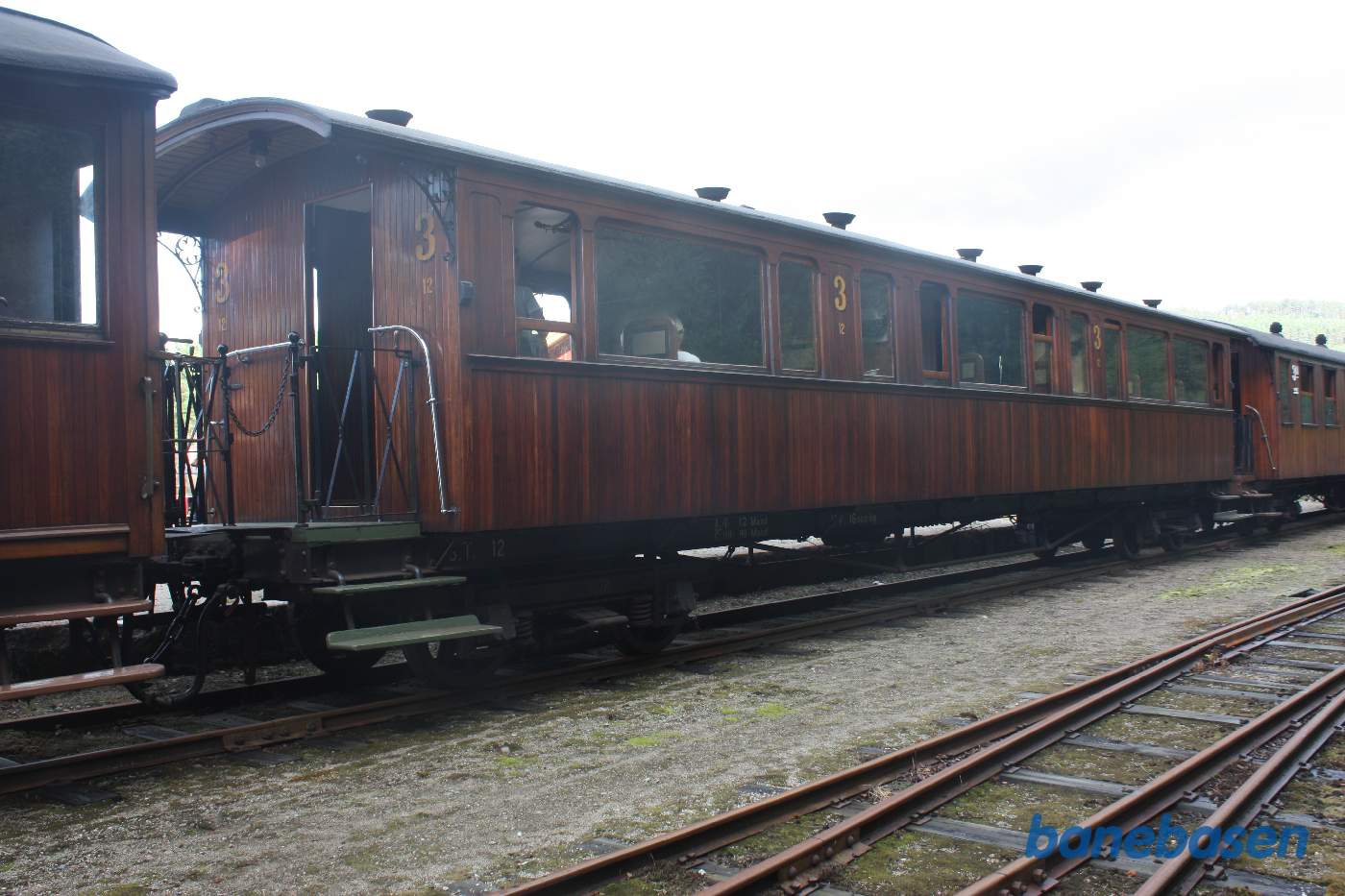 Den tredje bagerste vogn i persontoget