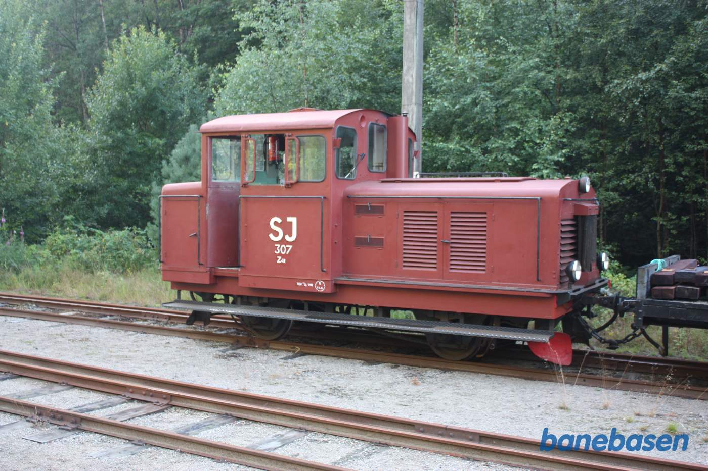 Smalsporet rangertraktor på sidesporet